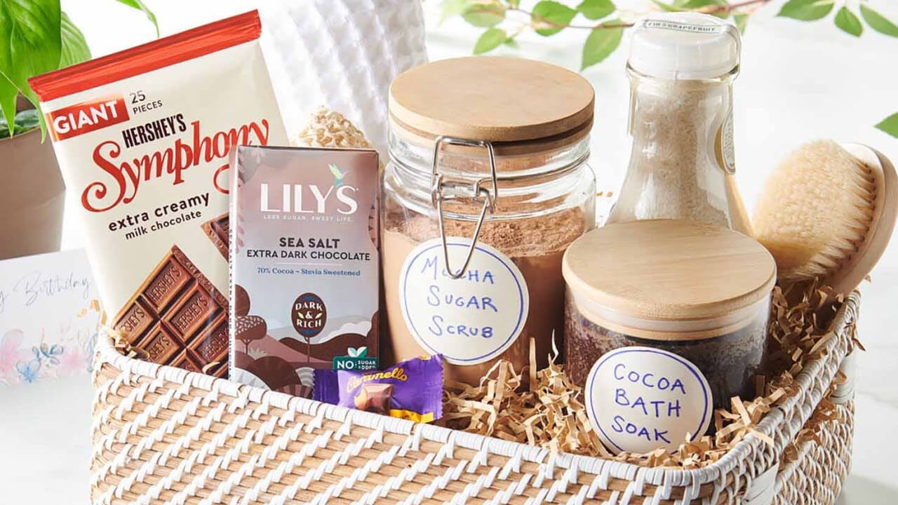 self care basket filled with hersheys candies and spa relaxation treatment accessories
