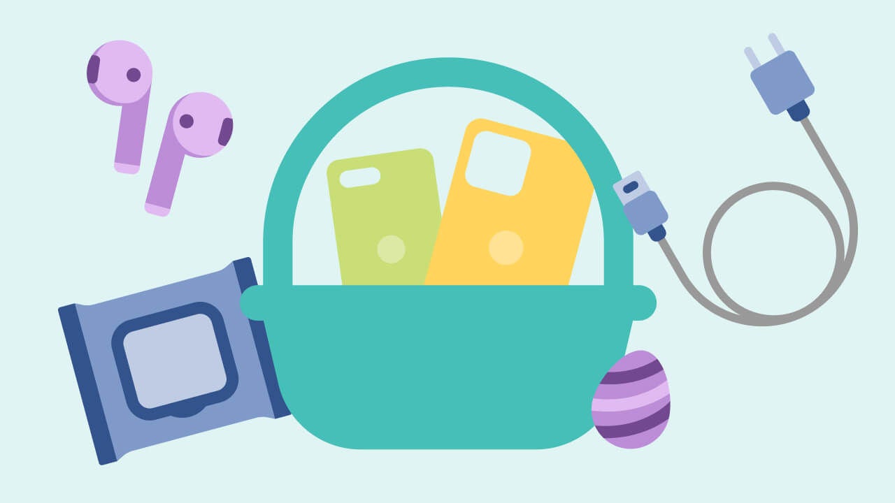 basket filled with ear buds, portable charger, cleaning wipes, and assorted hersheys candy
