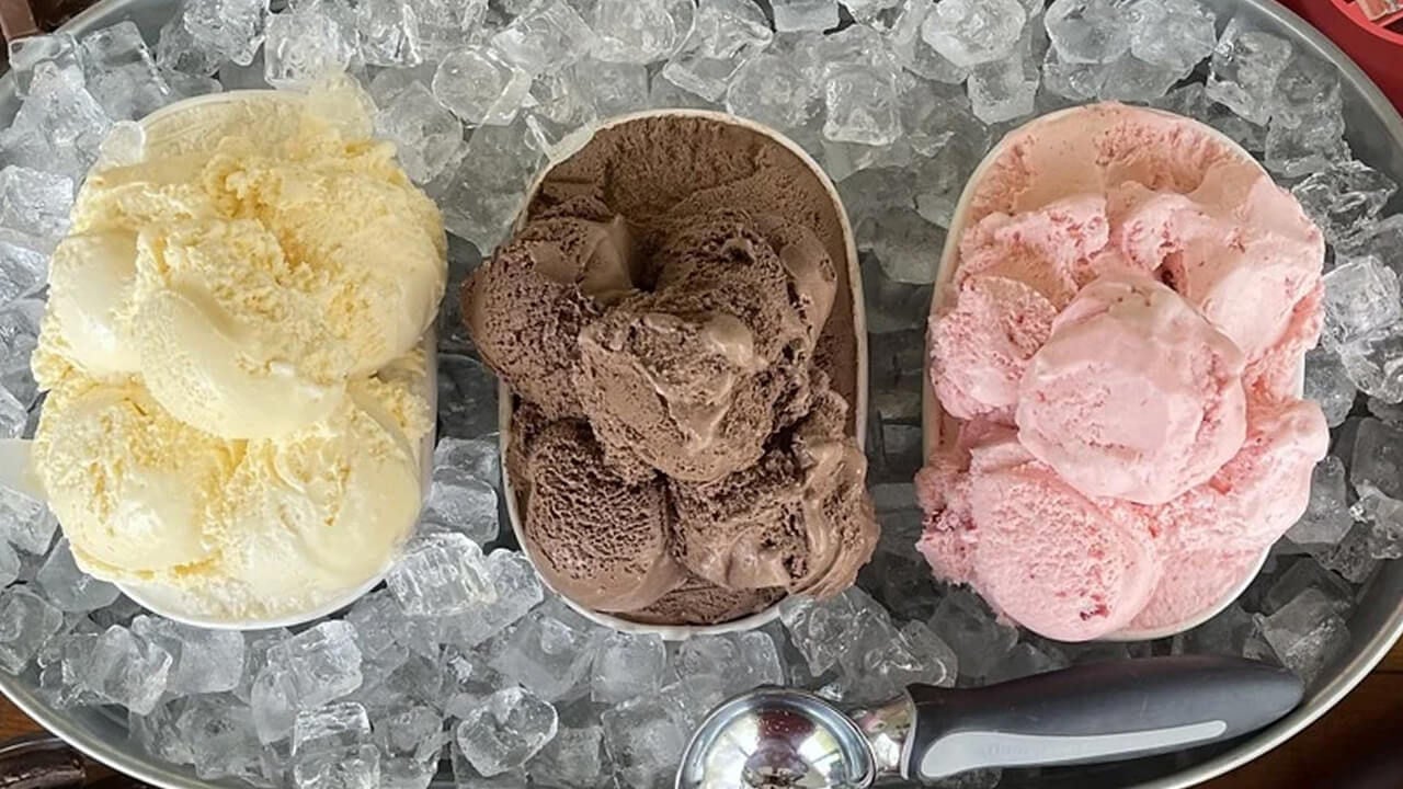 3 gallons of ice cream in a bowl of ice