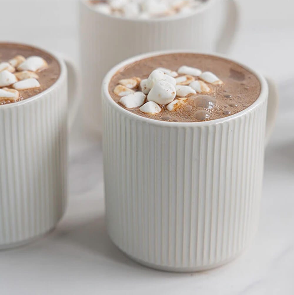 3 mugs of pumpkin spice hot chocolate