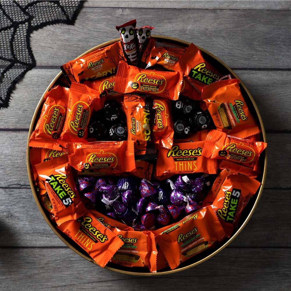 assorted hersheys candy inside pumpkin bowl