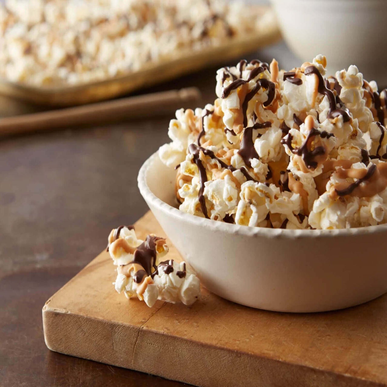 bowl of popcorn with chocolate drizzle