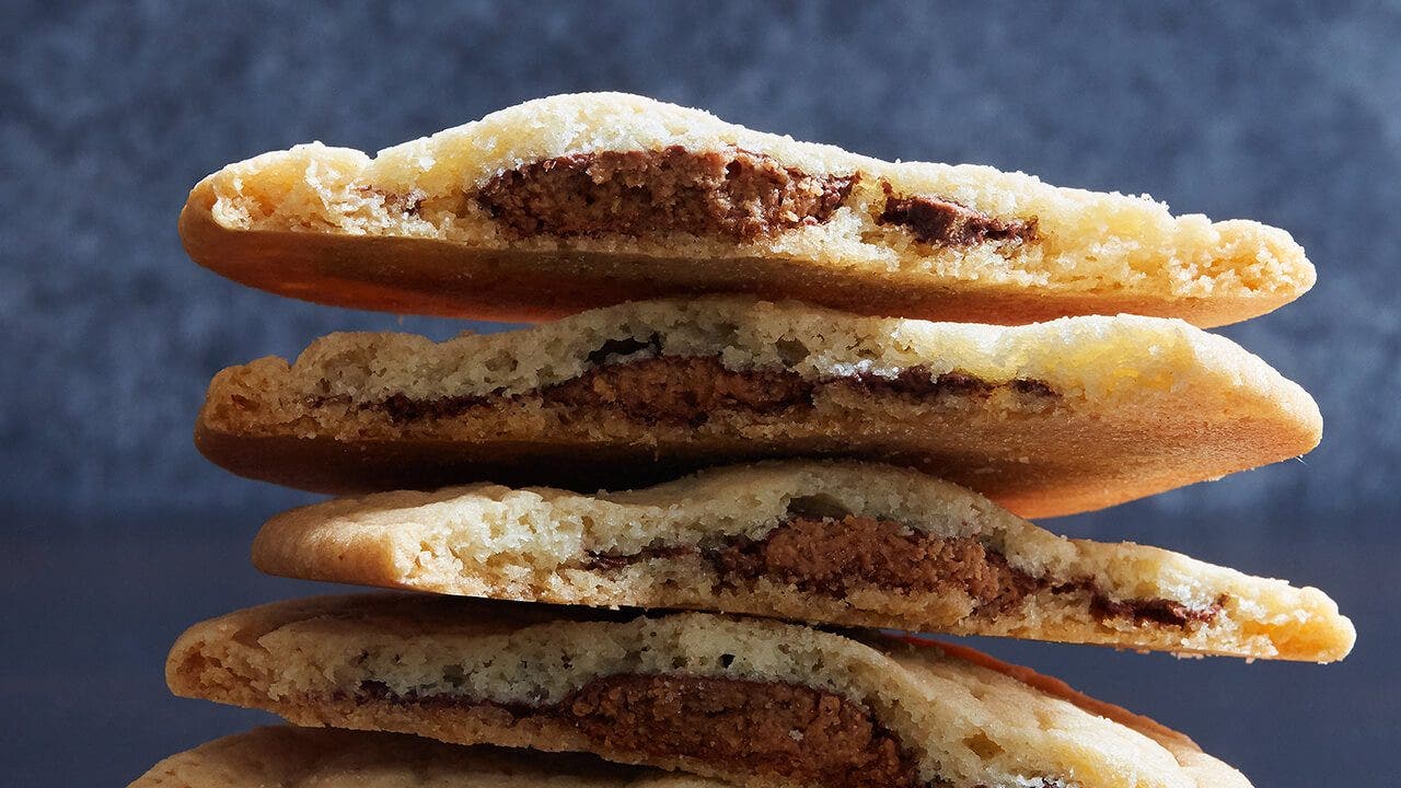 stack of reeses peanut butter stuffed sugar cookies