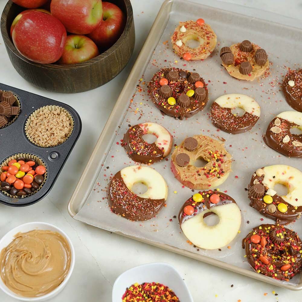 tray of hersheys candy dipped apple donuts