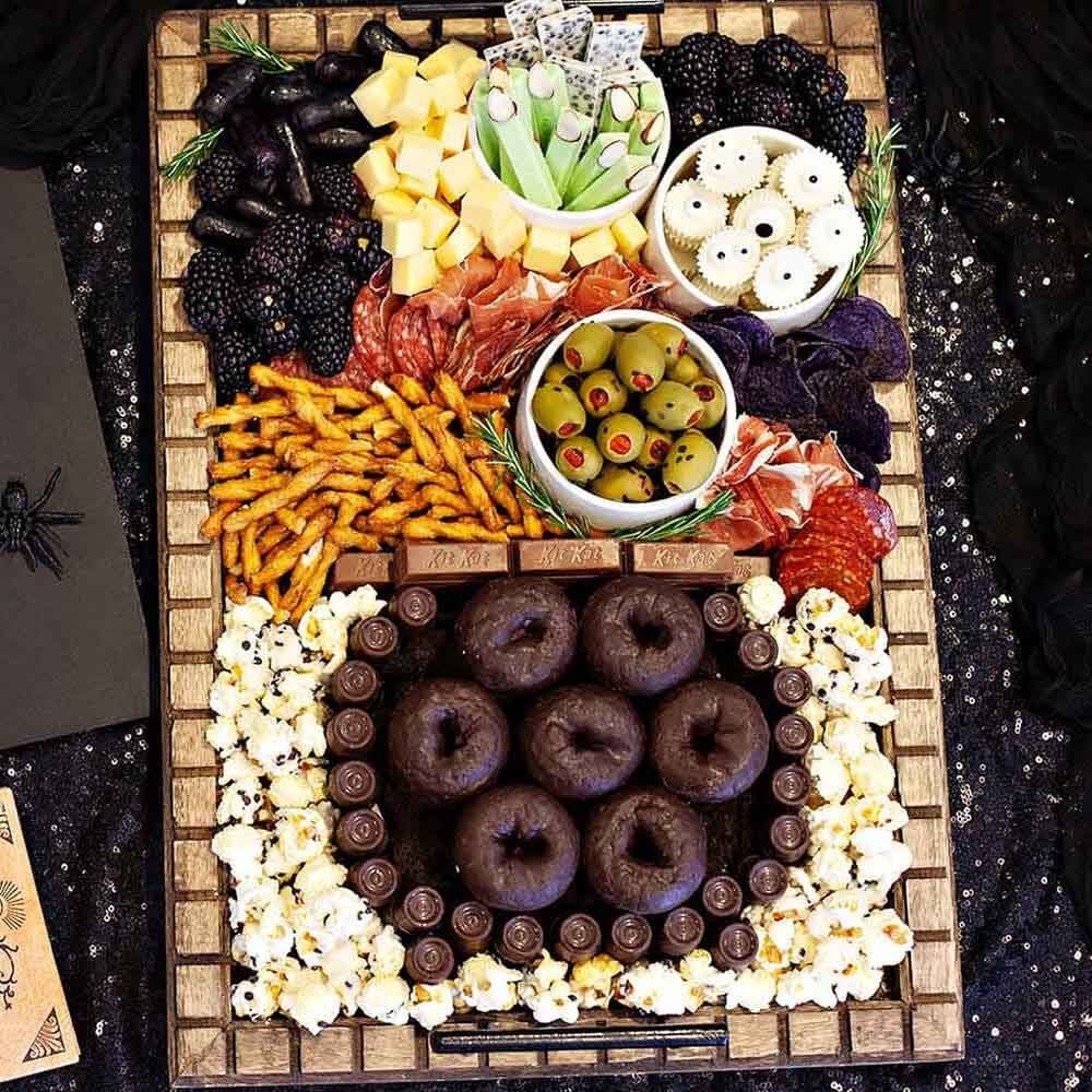 halloween candy charcuterie board made with hersheys candy and snacks