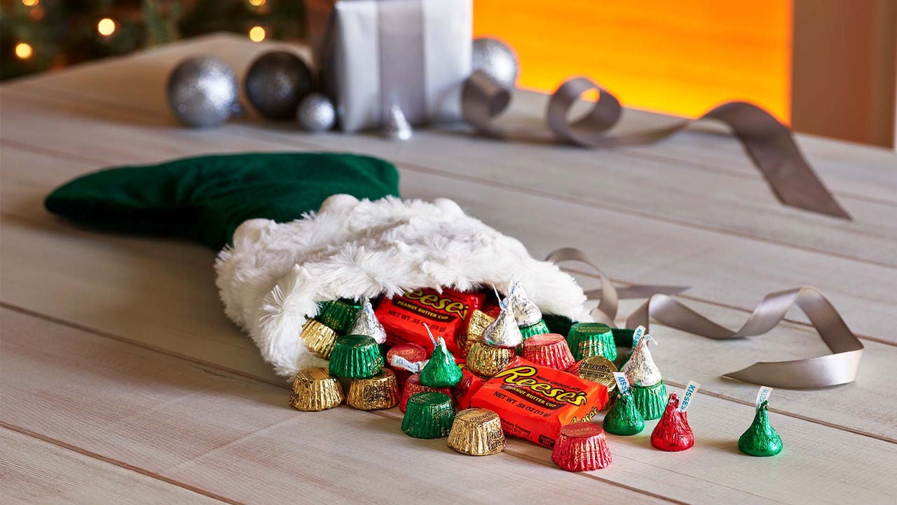 christmas stocking filled with assorted hersheys miniatures holiday candy