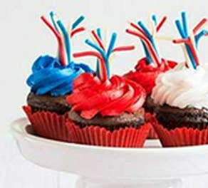 cupcakes with red, white, and blue icing, and pull 'n peel twizzlers on top
